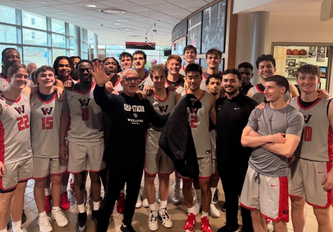 Wesleyan University basketball team in custom JNP gear
